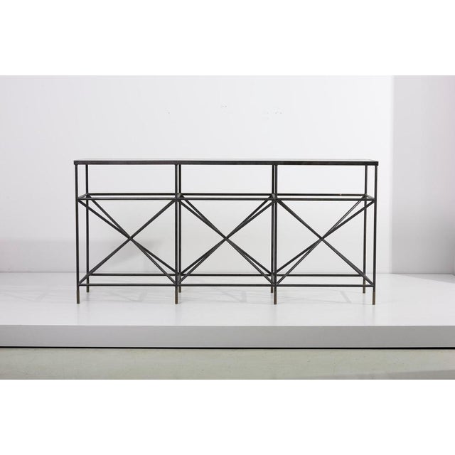 Giovanni Ferrabini open sideboard or shelf with black galvanised steel base and marble top, Italy, 1950s This piece is...