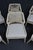 Set of six Essentials for Living “Loom” dining chairs featuring an intricate woven rope back design, natural gray wood...