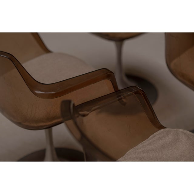 Beautiful set of six space age dining chairs, presumed French production, circa 1970s. The chairs feature sculptural dark...