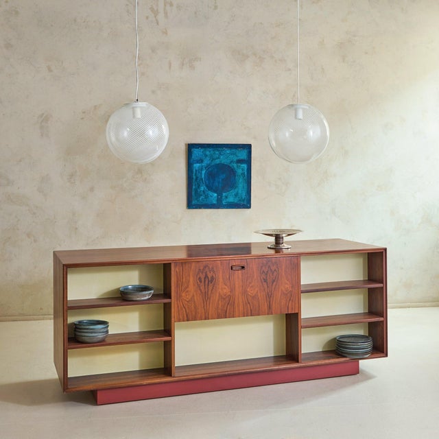An Italian abstract acrylic painting on wood panel by Alessandro Bonato, circa 1970s. The composition is defined by a...