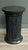A black tesselated stone ionic column pedestal stand table perfect for a plant, sculpture or drink side table. Attributed...