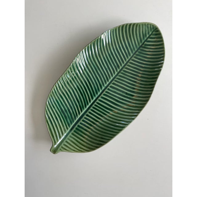 Large Vintage Palm Leaf Serving Dish or Catchall is 18” long and 9.5” wide making it a beautiful display piece. Quite...