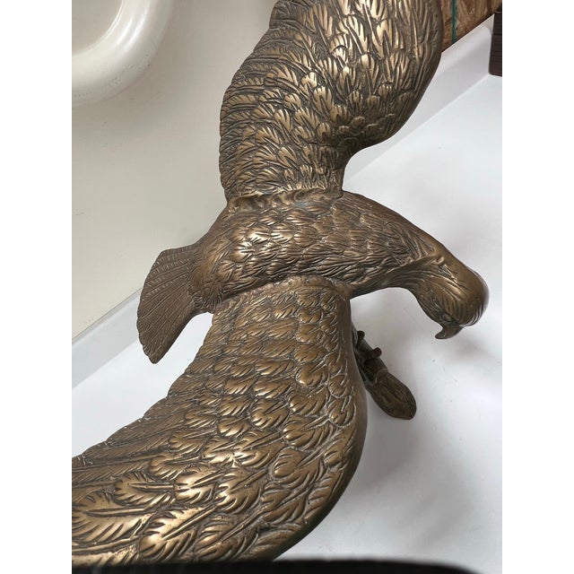 Spectacular detailed feather spread wings add dimension to this large 25” Eagle, alighting on a branch. A favorite subject...