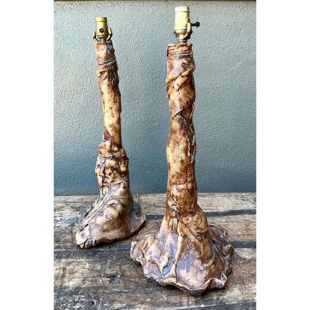 This pair of vintage hand-crafted faux bois ceramic lamps stands as a compelling example of sculptural mid-20th-century...