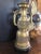 Tall brass table lamp with wonderful dragon heads. Intricate design work and with a wonderful patina. Working condition as...