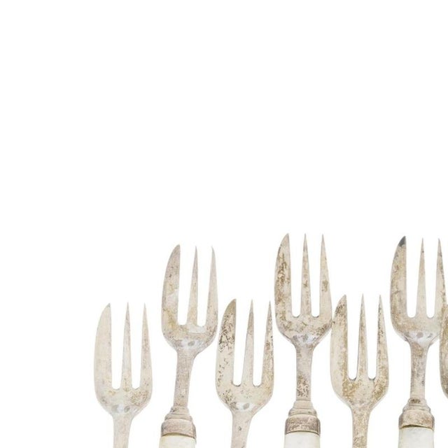 Silver - Forks with silver - Jose Rosas. Portuguese; 20th century; in silver with a bakelite handle resembling mother-of-...