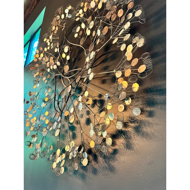 Up for sale is an iconic, authentic Mid-Century Modern "Raindrops" wall sculpture by the renowned design studio Curtis...