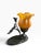 Sculptural accent table lamp featuring a luminous amber art glass shade in a softly flared floral form, paired with an...