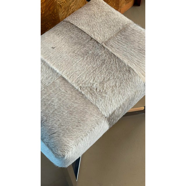A Modernist Cowhide And Chrome Ottoman, 20Th Century. For Sale - Image 9 of 12