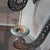 A magnificent and very large pair of beautifully cast antique iron wall sconces in the Neo-Gothic, late-Victorian style....