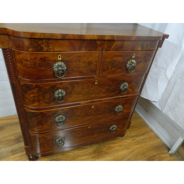 Experience the elegance of the Regency era with this exquisite Ogee Scotch Chest of Drawers. Crafted from rich mahogany,...
