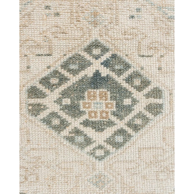 The Heriz district of NW Persia has been weaving carpets for over a century, with geometric designs and tonalities ranging...