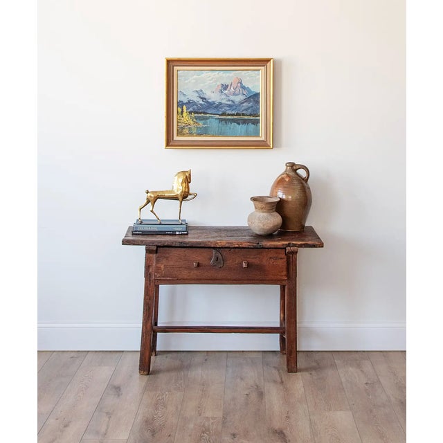 This beautiful antique table is a classic example of humble provincial craftsmanship, prized for its honesty of form and...