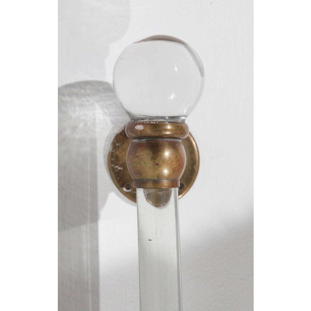 42-inch long Victorian towel bar with naturally darkened ends. Bar is 1 inch in diameter. Round glass ends. Brass brackets.
