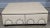 Late 20th Century Large Designer Beige Leather Upholstered Ottoman Pattern Tack Trim Bun Feet For Sale In Cleveland - Image 6 of 6