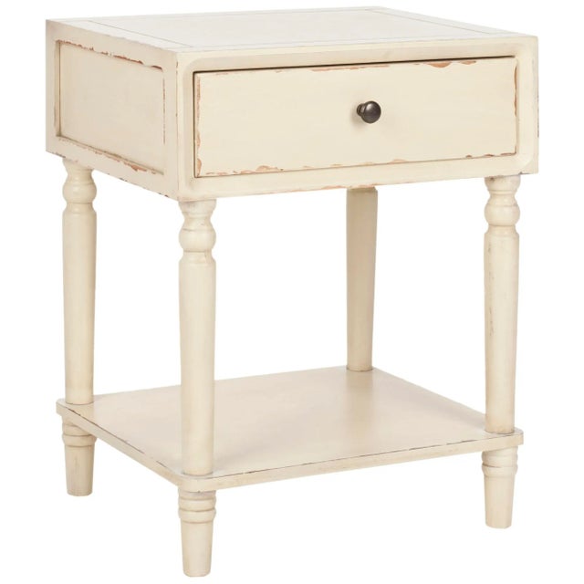 Crafted with poplar wood in a vintage cream painted finish, the nightstand brings just the right amount of storage and...