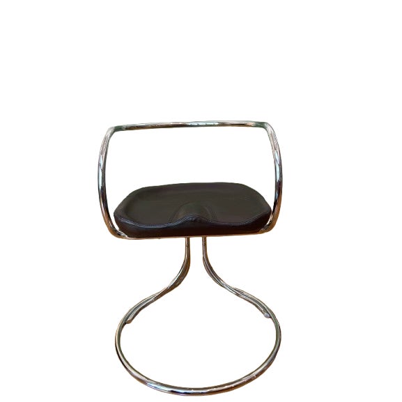 Offered is a sculptural pair of cantilever lounge chairs based on the 1927 Constructivist design by Russian avant-garde...