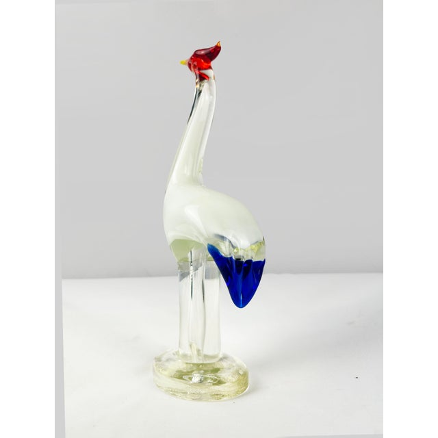 A unique statuesque murano glass sommerso figurine of a chinese crane, made in italy circa 1960. The beak and head are...
