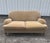 Ralph Lauren Wyland Loveseat Sofa in tan velvet fabric. The sofa has down wrapped seat cushions and turned wooden front...