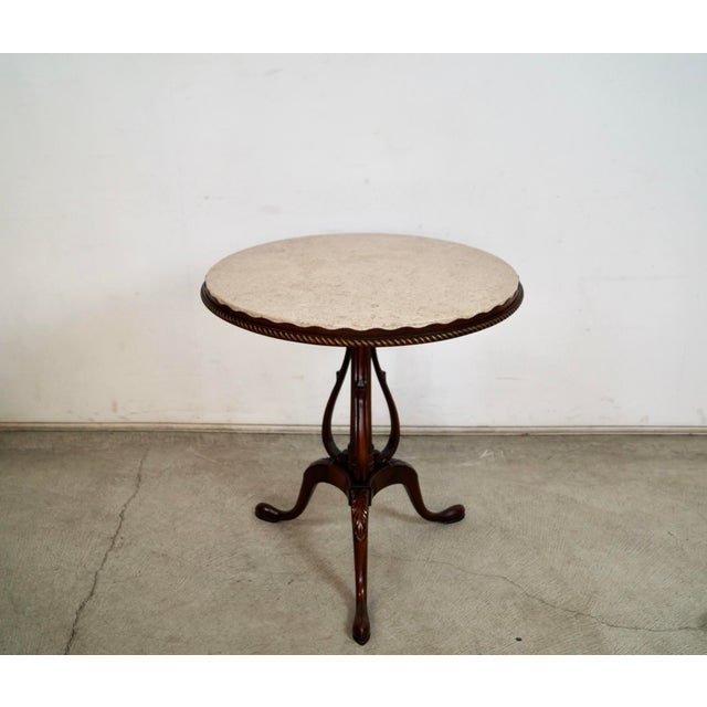 Antique chippendale pie crust table for sale. It's in great condition, and has three cabriole legs with a pie crust top....