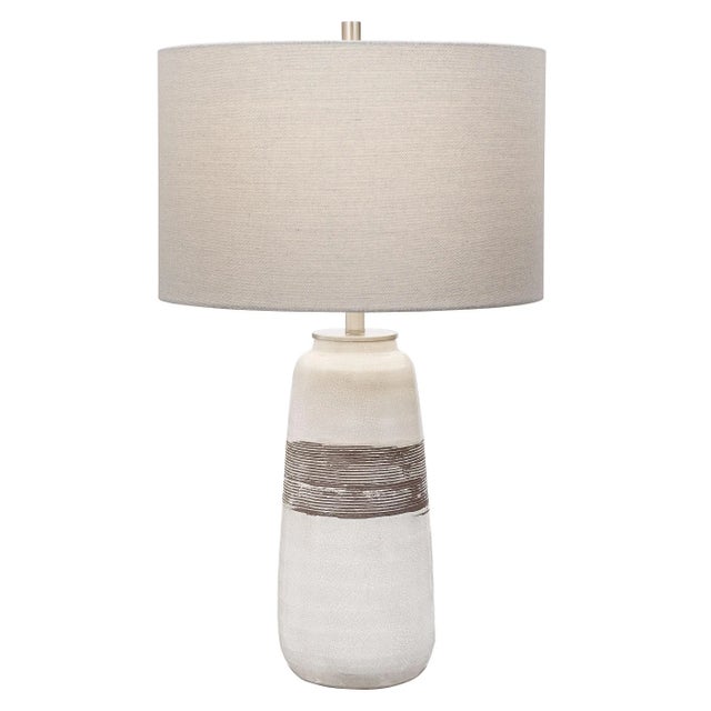 Showcasing A Rustic Casual Look, This Ceramic Table Lamp Features An Off-white Crackle Glaze With Distressed Rust Brown...