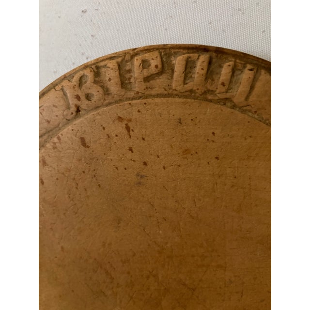 Antique round bread board with carving at top that says BREAD So many uses and decor ideas