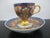 Japanese Arita ware Imari porcelain cup and saucer with a Gokunishiki Kinsai Koimari style design produced by Kisen Kiln...
