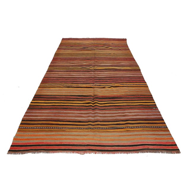 Handwoven vintage striped kilim rug from Denizli region of Turkey. Approximatelly 45-55 years old. In very good condition.