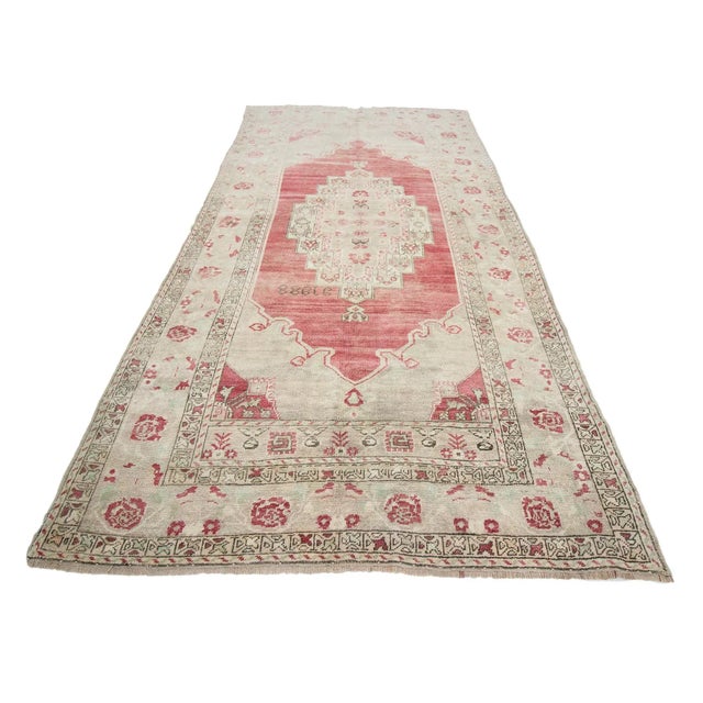 Washed out vintage rug from Konya region of Turkey. Dated 1988. In very good condition