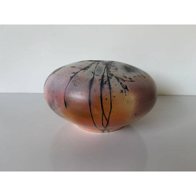 Striking vintage handmade studio pottery vase featuring a sculptural low-profile form with a wide mouth and an expressive...