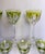 Here is a stunning set of seven vintage green overlay crystal wine glasses, attributed to Moser in the iconic Lady...