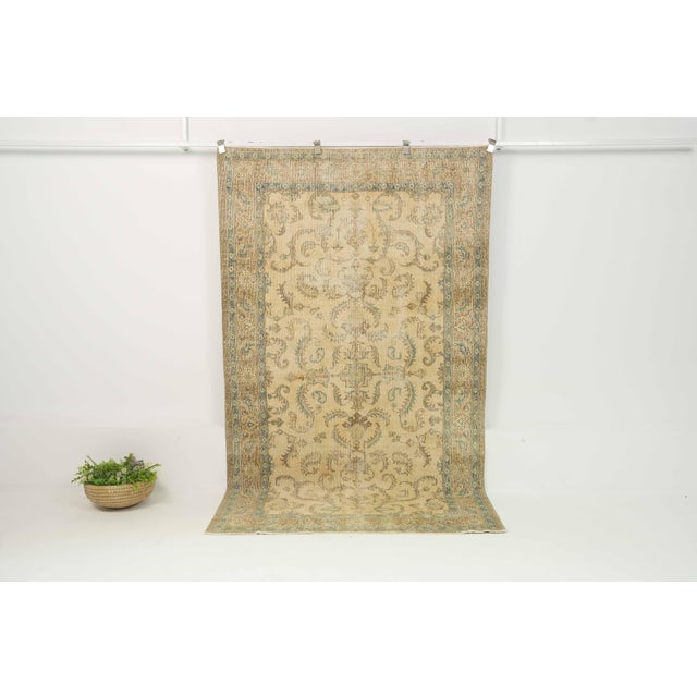 Vintage Hand-Knotted area rug is a semi-antique vintage area rug. The '70s Eastern region of Anatolian's unique rug is...