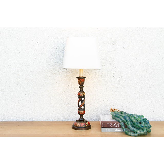 A masterwork of Kashmiri lacquerware and hand-painted botanical art. This elegant table lamp is crafted from an authentic...