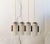 This ceiling lamp, made of glass and teak elements, is designed in a clean mid-century style and dates from the 1960s. The...
