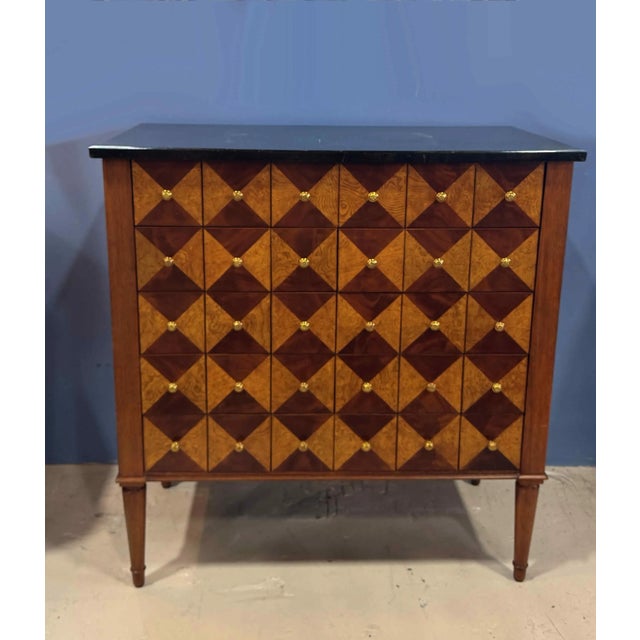 Maitland Smith marble top 30-drawer apothecary chest. Features crotch mahogany sides with tessellated black marble top and...
