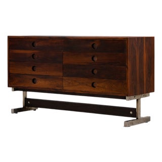 Sérgio Rodrigues “Dalmo” Chest of Drawers in Rosewood and Chromed Steel — Oca, Brazil, c. 1960 - Lot 843 For Sale