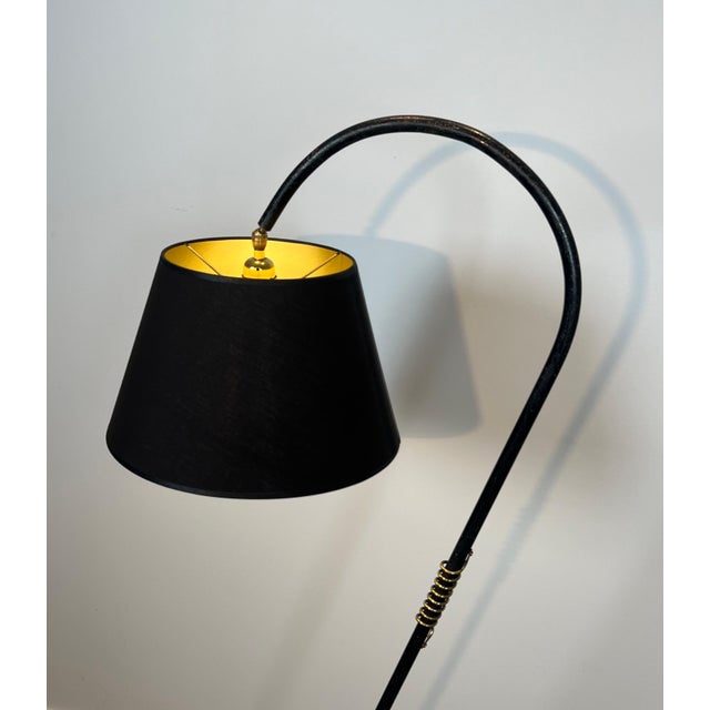 Metal 1950s Black lacquered and brass floor lamp in the style of Jean Royère For Sale - Image 7 of 12