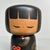 This kokeshi doll was created by the Japanese artist Tsuneyuki and is titled Kikumusume, which means “Chrysanthemum Girl.”...