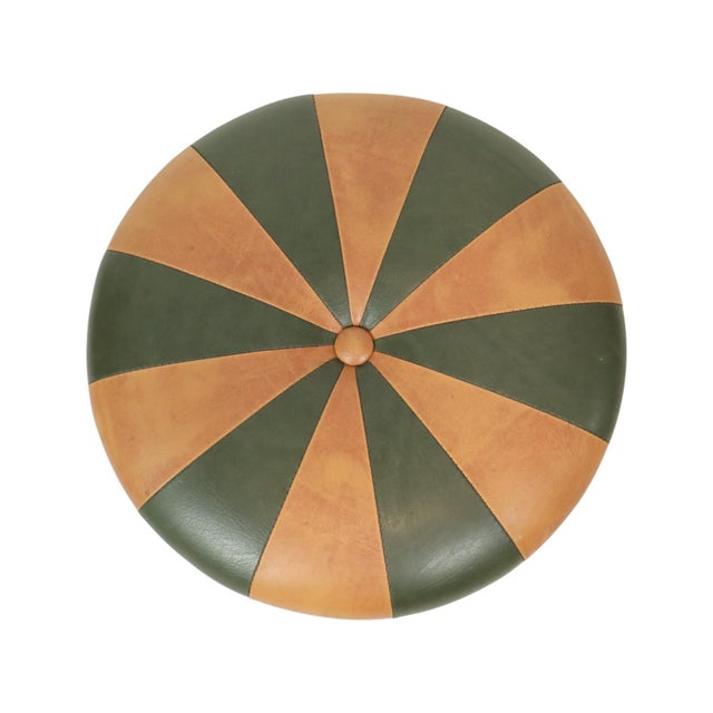 Cool vintage round pouf in Moroccan patchwork style, made from a wooden base and upholstered in high-quality two-tone...