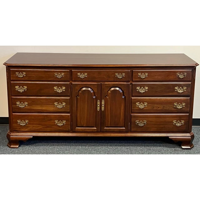Vintage 11 drawer solid cherry dresser by Ethan Allen from their popular Georgian Court Collection. There are four...