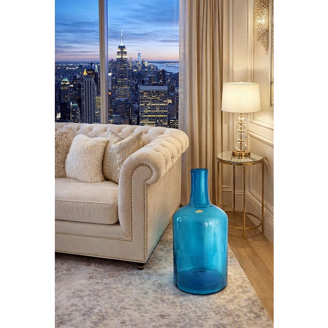 Offering a vintage Blenko Glass turquoise blue decanter vase # 6955L, designed by Joel Myers. This item is signed with the...