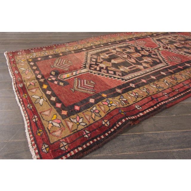 Beautiful Vintage Hamadan Handmade Wool Rug with a red field. This rug has multi-color accents in an allover multi-...