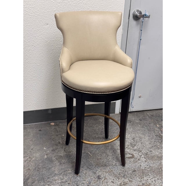Design Plus Gallery presents the Tracy Swivel Barstool by Century Furniture. This elevated seating design is upholstered...