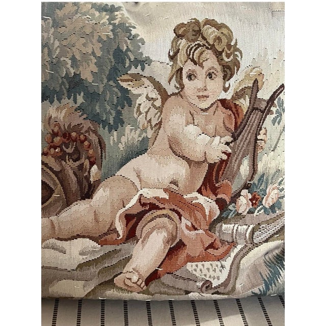Phenomenal large square pillow featuring a rare cherub with lyre beside a book, giving it a charming and classical...