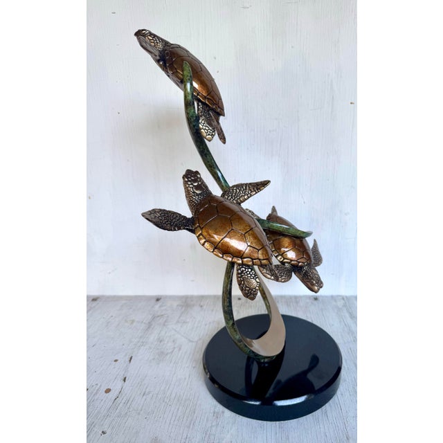 Whimsical yet refined, this fine bronze sea turtle sculpture by Joseph Quillan for Moonlight Carousel beautifully captures...