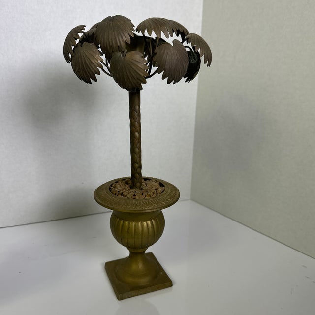 This pair of palm tree candle holders are in rare form. The proportions are perfect. Everything about them is extremely...