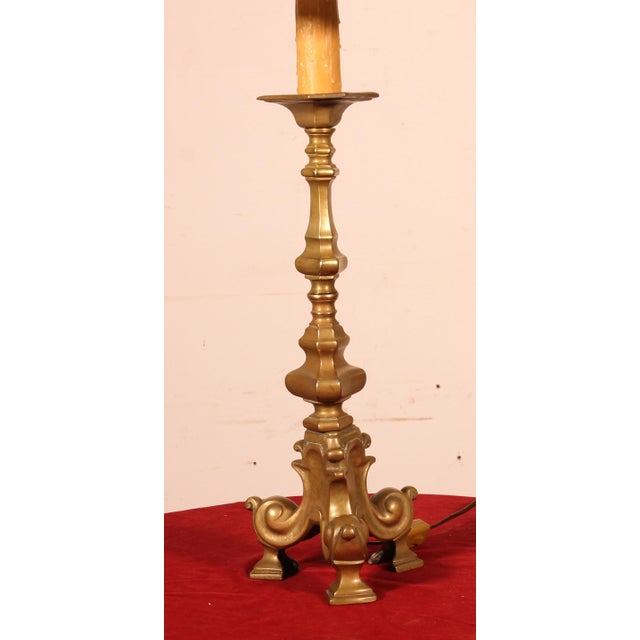 A beautiful lamp formed from an 18th-century French bronze candlestick, converted into a lamp. It has its original...