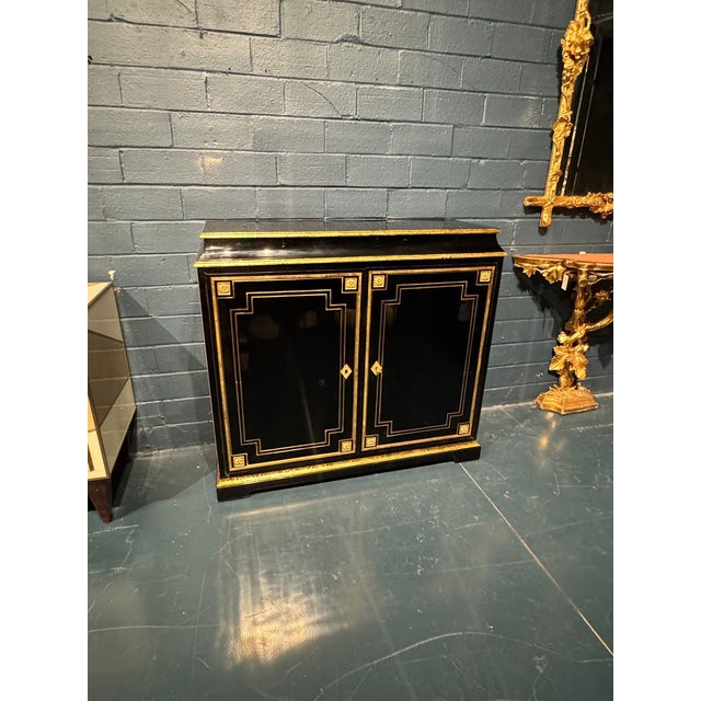 The French Napoleon III Style Black Side Cabinet is a stylish and elegant piece of furniture perfect for any home. This...