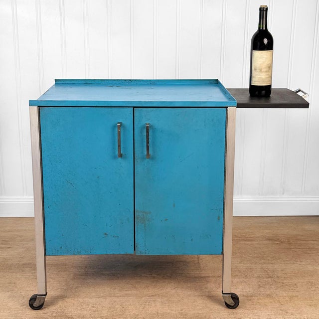 An Industrial Steel Teal Blue Rolling Cart Cabinet, c.1980's - Original Teal Blue Finish with Silver Legs - Recessed Top...