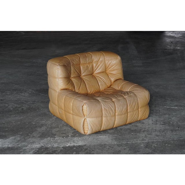 Kashima Lounge Chairs in Tan Leather by Michel Ducaroy for Ligne Roset, 1980s, Set of 2, in Very Good conditions. Designed...